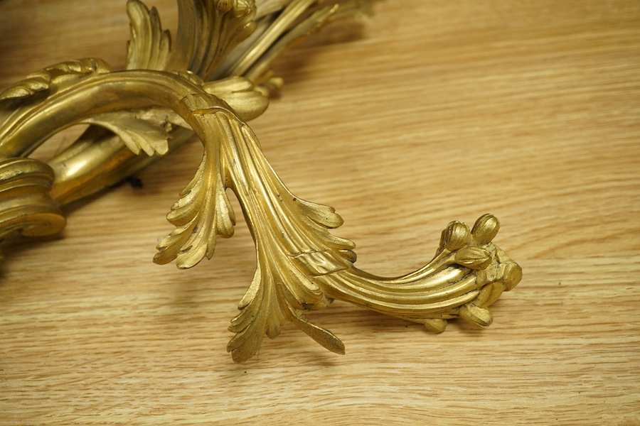 A pair of Rococo style ormolu wall lights, 74cm high. Condition - fair